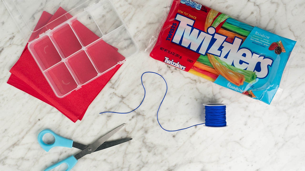 craft supplies and candy spread out on counter top