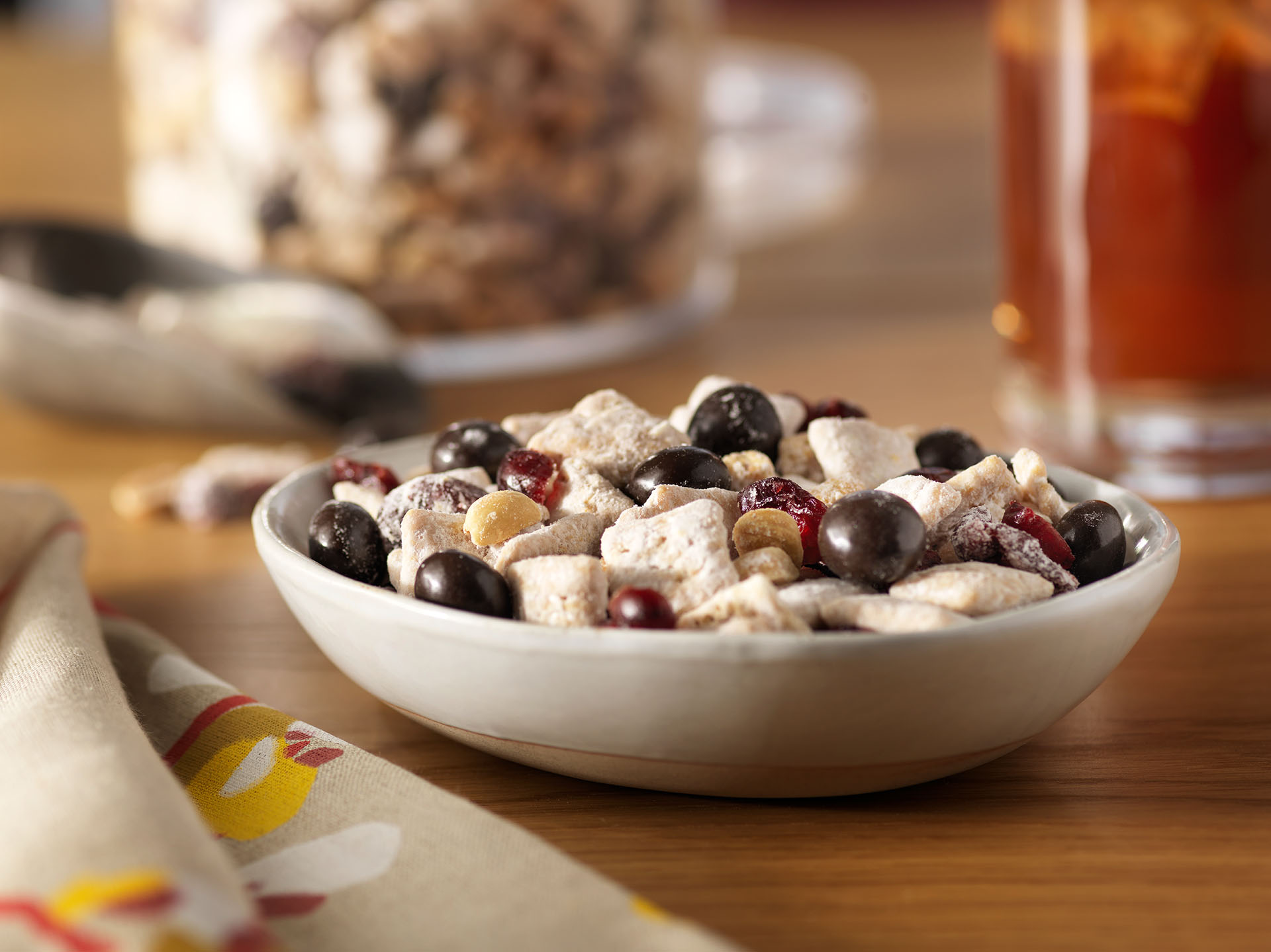 peanut butter and brookside snack mix in a shallow bowl on a dining table