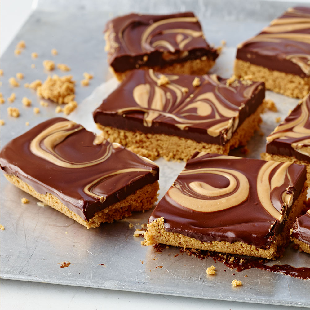 plate of no bake peanut butter chocolate bars