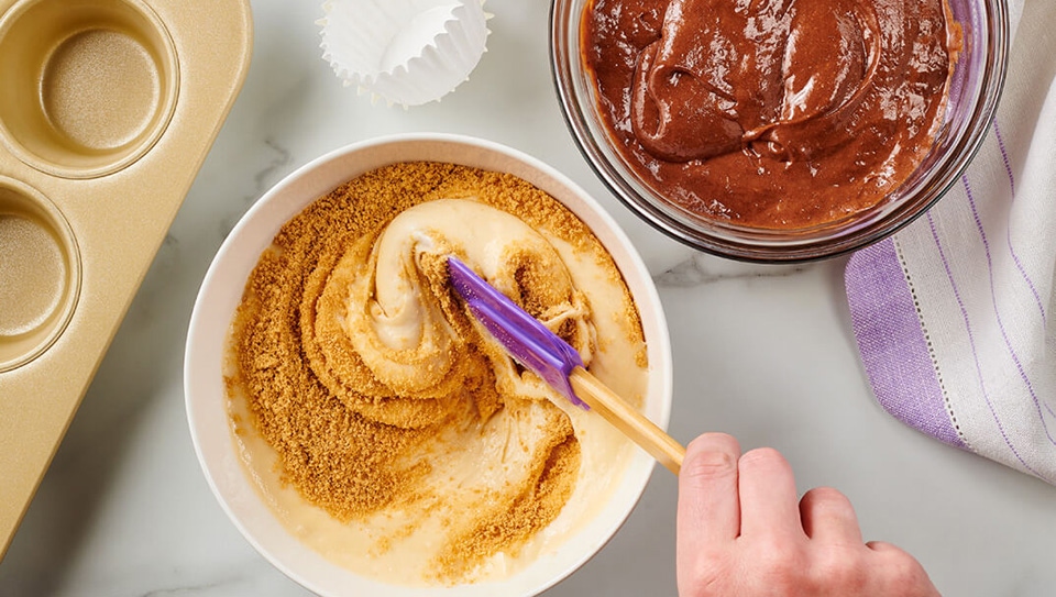 cupcake batter in large mixing bowls